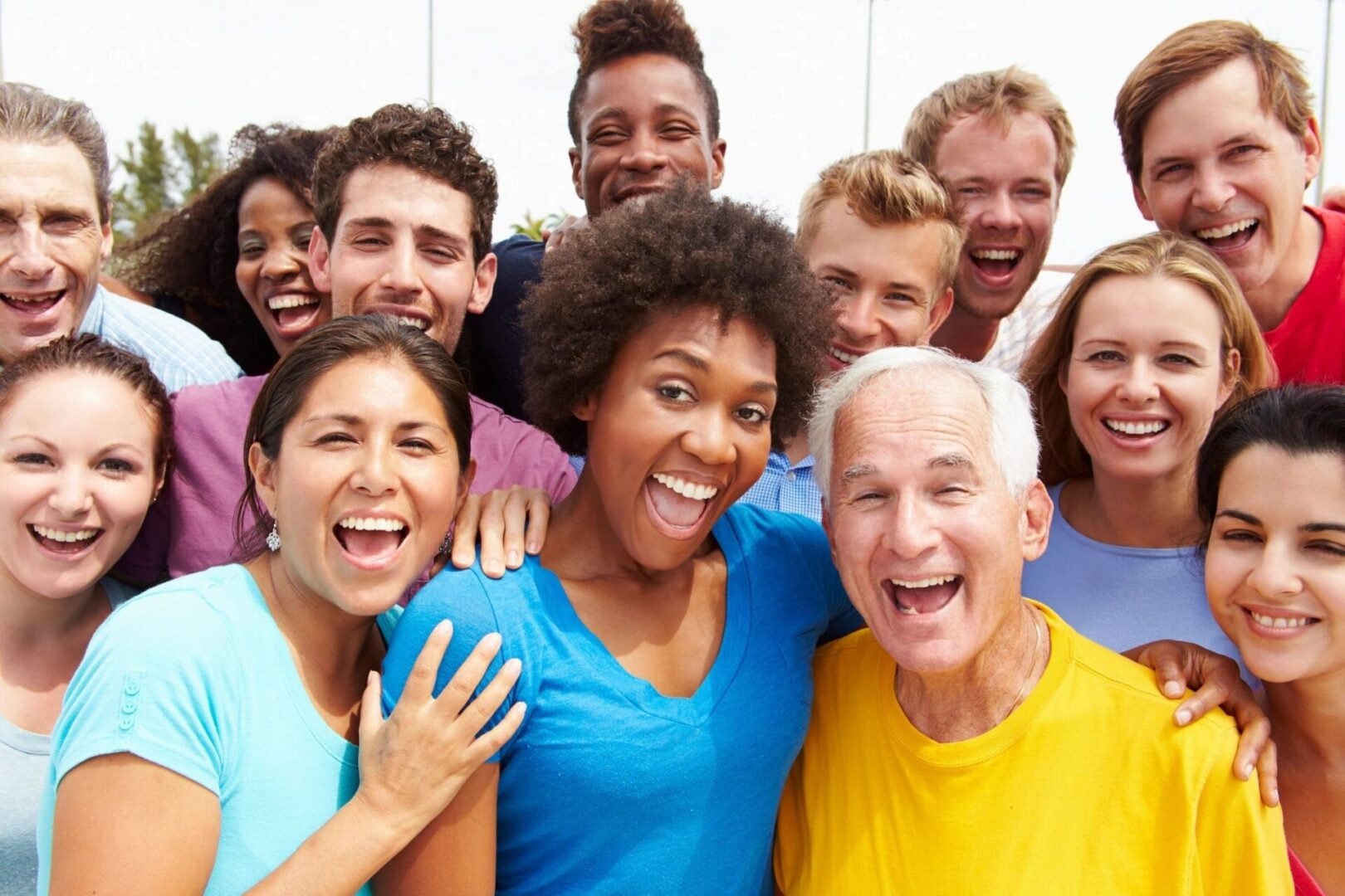 Diverse community group smiling together